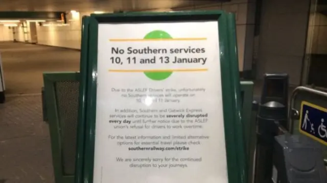 A sign at Three Bridges station