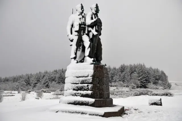 A snow covered commando memorial at Spean Bridge in the Highlands: