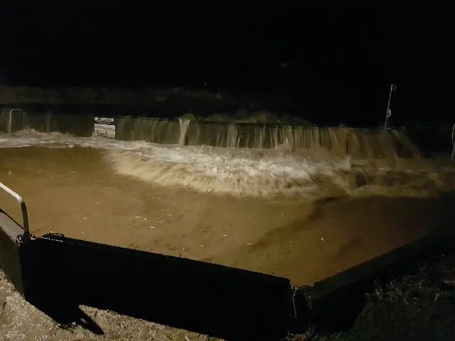 Waves coming over the sea wall in Hornsea