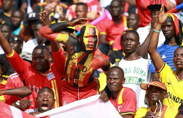 Ugandans cheer their team