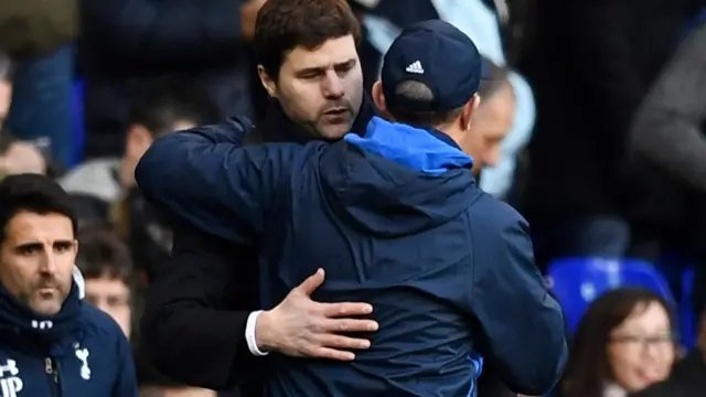 Mauricio Pochettino and Tony Pulis embrace at full time