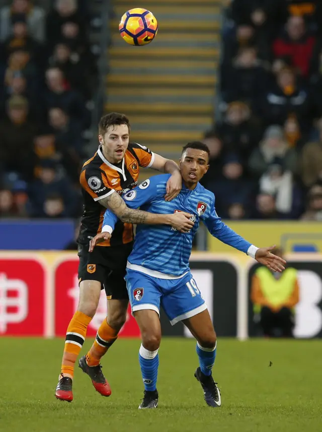 Bournemouth"s Junior Stanislas in action with Hull City"s Ryan Mason