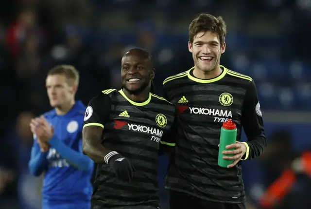 Chelsea"s Marcos Alonso celebrates with Victor Moses after the game