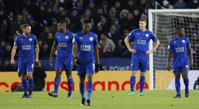 Leicester look dejected after conceding a second goal