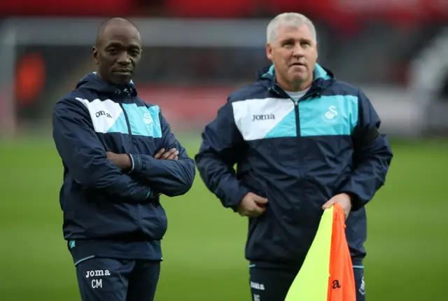 Swansea assistant manager Claude Makelele (left) and coach Nigel Gibbs