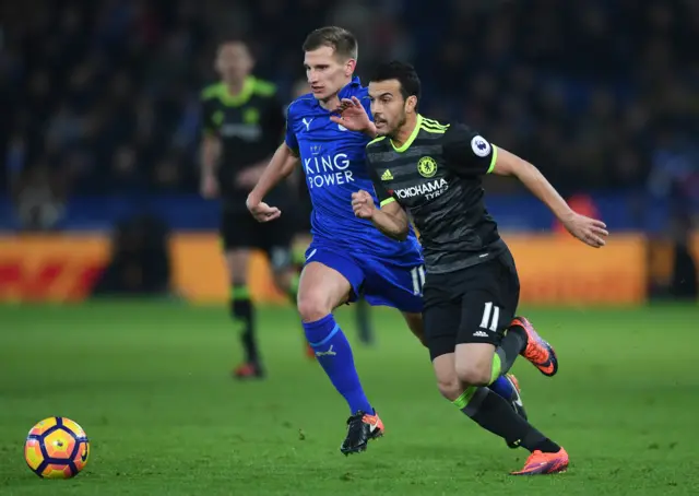 Pedro of Chelsea is closed down by Marc Albrighton of Leicester City