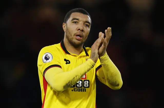 Troy Deeney applauds