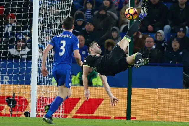 Cahill attempts an overhead kick