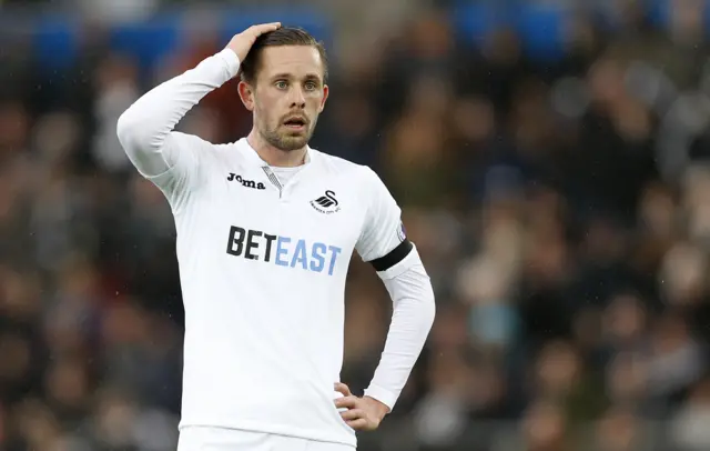 Swansea's Gylfi Sigurdsson looks dejected