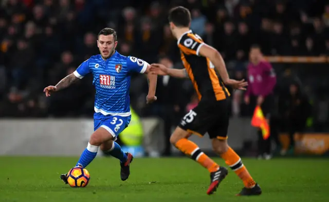 Jack Wilshere of AFC Bournemouth is faced by Ryan Mason of Hull City