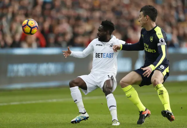 Swansea City"s Nathan Dyer in action with Arsenal"s Laurent Koscielny