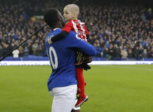 Romalu Lukaku carries Bradley Lowery