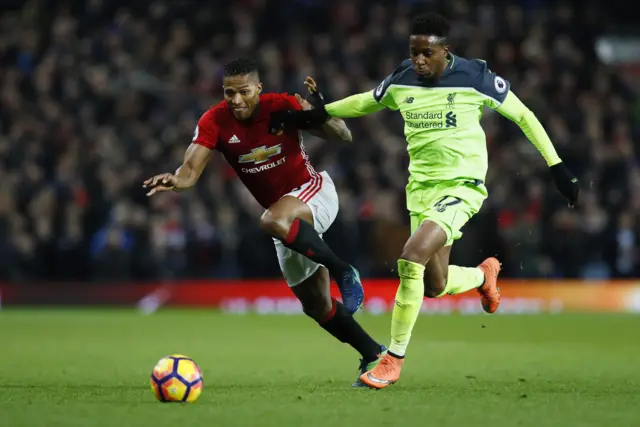 Divock Origi and Antonio Valencia