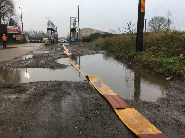 Hose set up to take water from nearby river, to tackle the blaze