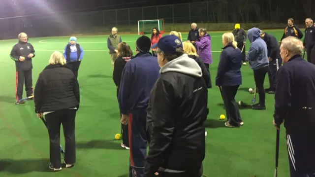 Bromsgrove Hockey Club head coach Alan Gormley introduces new recruits to the first walking hockey session on 9 January