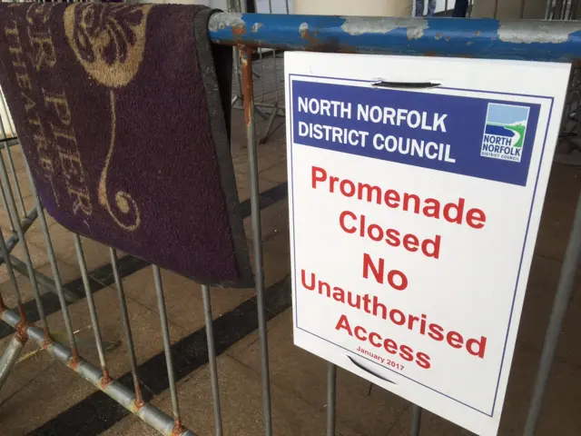 Sign for closure of promenade