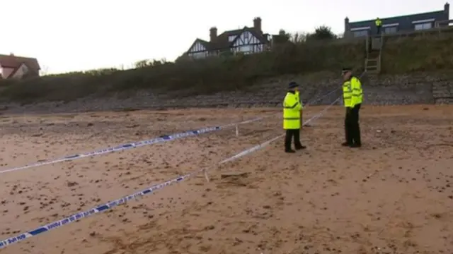 Police tape on Thorpeness beach