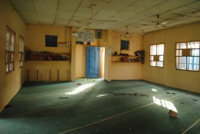 Broken glasses and other materials are scattered on the floor of a room in a building where a bomb exploded at Nigeria"s northeastern University of Maiduguri in Maiduguri, Nigeria, Monday, Jan. 16, 2016.