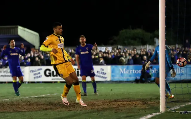 Sutton's Maxime Biamou scores the winner