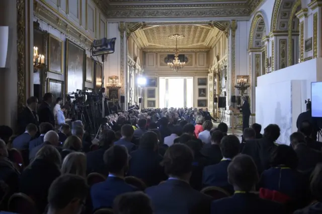 Theresa May speaking in London