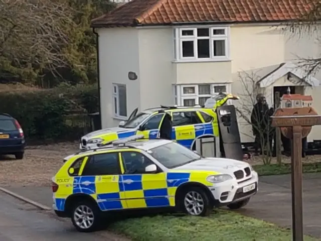 Police cars at Crowfield