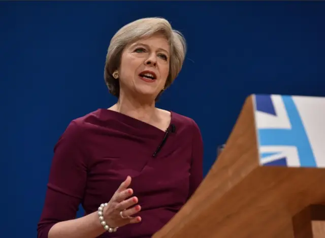 Theresa May speaking at the Conservative conference in October