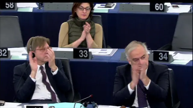 Guy Verhofstadt clapping in European Parliament