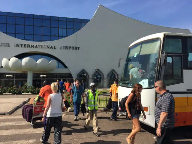 Tourists at the airport in The Gambia