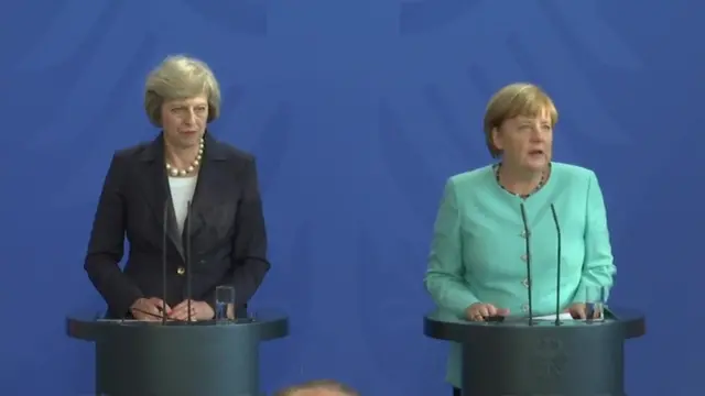 Theresa May and Angela Merkel