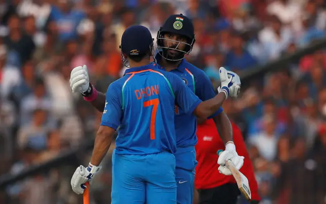 Yuvraj Singh congratulates his teammate