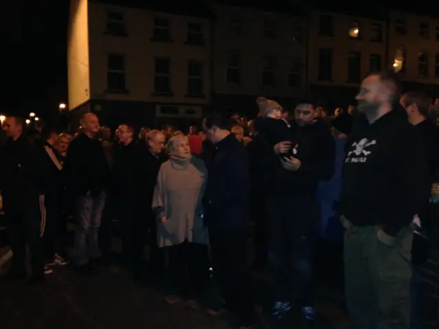 Crowds outside Martin McGuinness' house in the Bogside