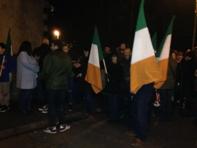 Crowds outside Martin McGuinness' house in the Bogside