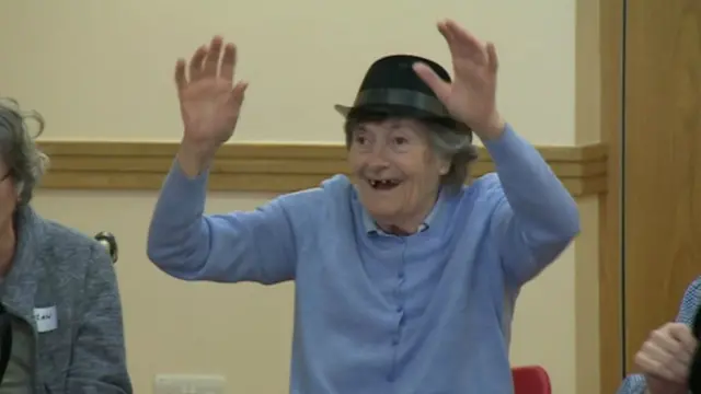 Woman taking part in dementia dancing class