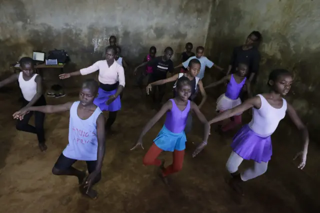 Young ballerinas practice in a classroom at Spurgeons Academy, which provides education for free to about 427 orphans and less privileged children from Kibera slums through charity in Nairobi, Kenya, 18 January 2017