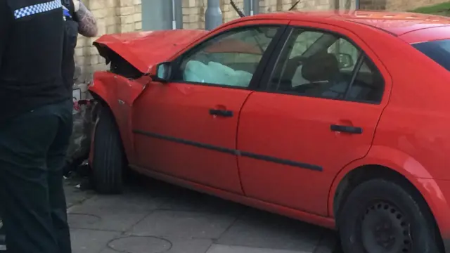 Car that's collided with building