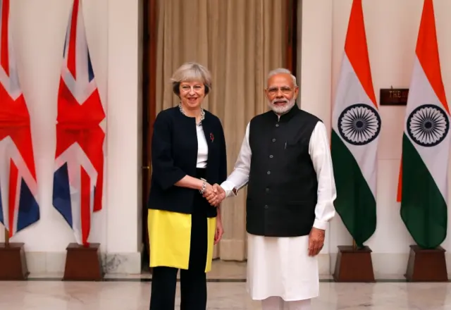 Theresa May and Narendra Modi