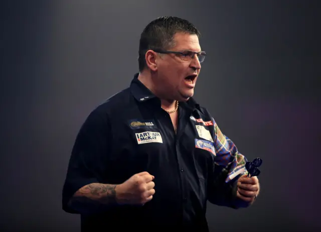 Gary Anderson celebrates