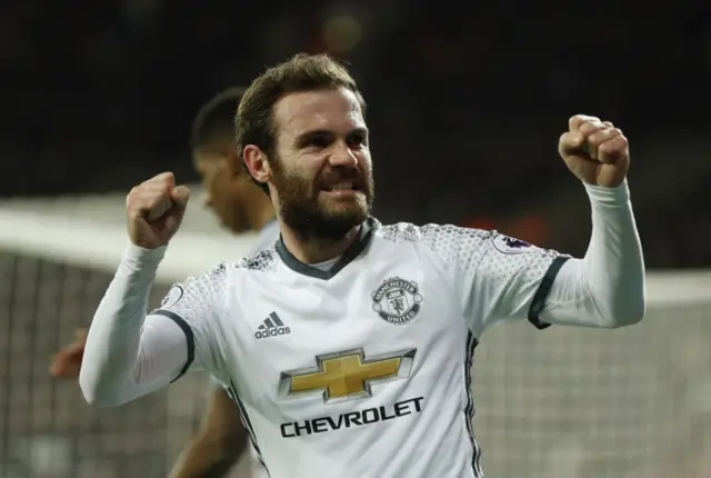 Juan Mata celebrates