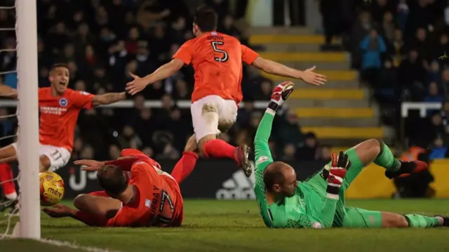 Lewis Dunk scores