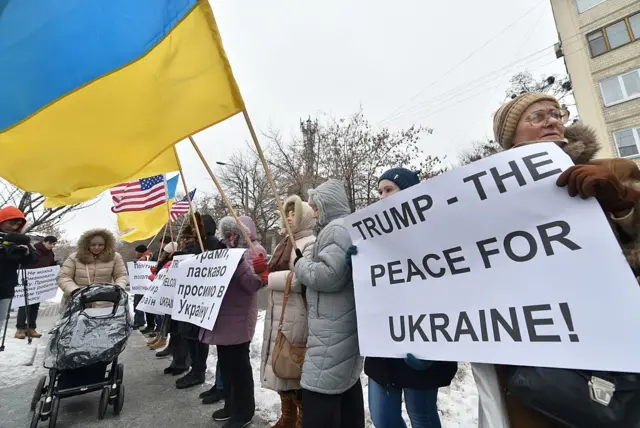 Crowds outside the US embassy in Kiev welcome the coming administration