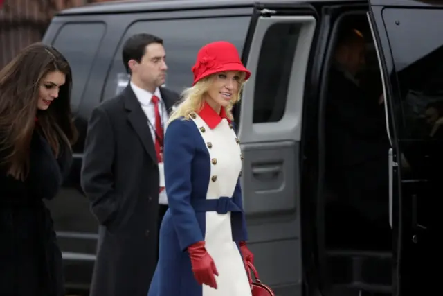 Trump's adviser Kellyanne Conway (right) departs for a church service