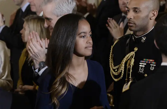 Malia Obama leaves the State Dining room of the White House