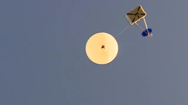 Ohbot being launched into the sky