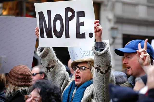 A protester outside Trump Tower in New York today