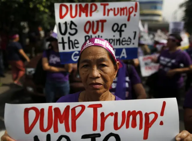 A Filipino protestor holds a placard during a protest rally in front of the US embassy in Manila, Philippines, 20 January 2017, on the eve of President-elect Donald Trump"s inauguration as the 45th president of the United States.