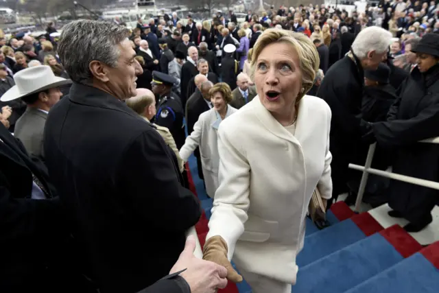 The Clintons greeted dignitaries on the dais ahead of the ceremony