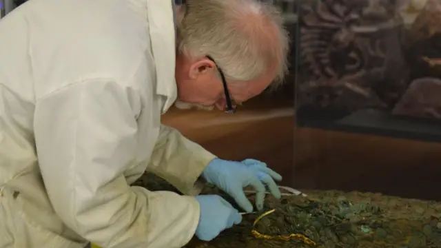 Coins being separated