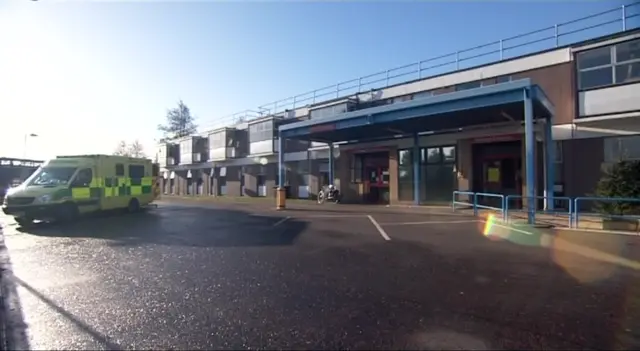 James Paget University Hospital entrance, with ambulance outside