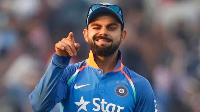 Virat Kohli celebrates