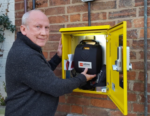 Tony Haines with his defribillator